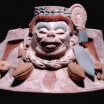 Ceramic cacao vessel lid from Tonina, cacao beans guarded by monkey (Photo in public domain) Maya Exhibition, Canadian Museum of Civilization, Gatineau